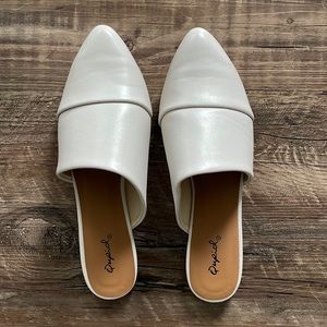 White faux leather mules
